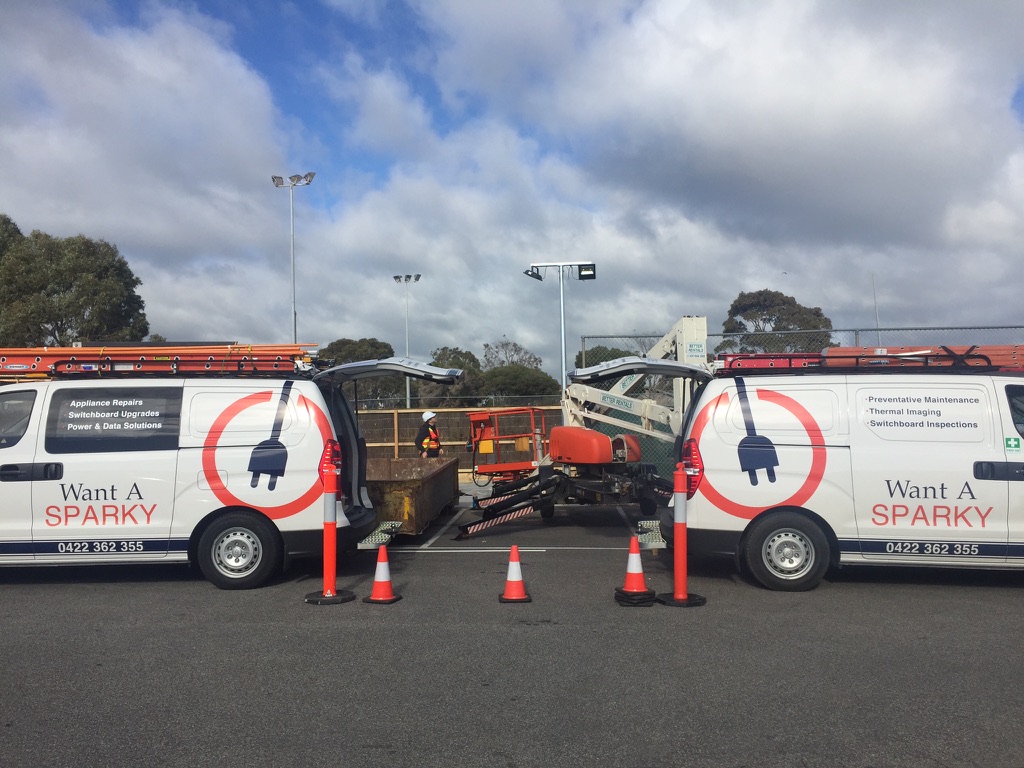 Want A Sparky service vehicles at a work site